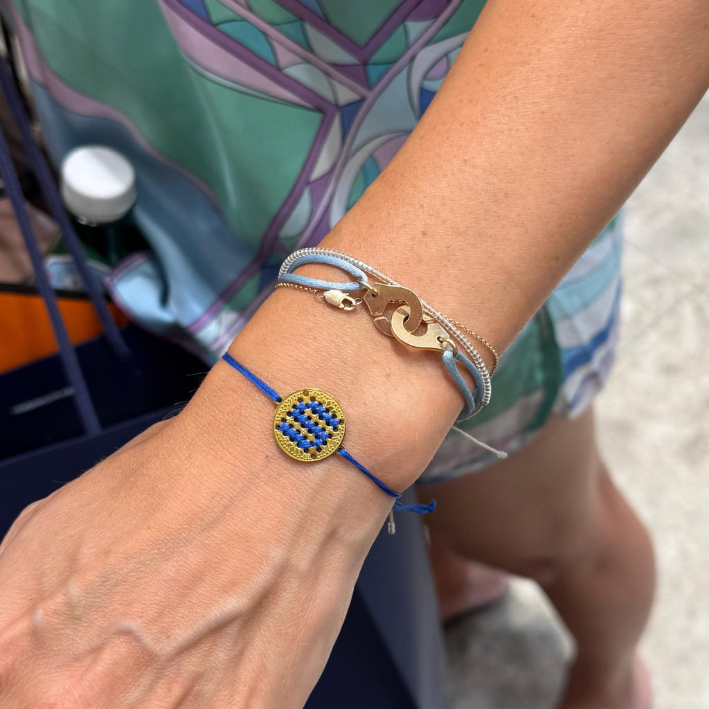 BRACCIALE CORDINO MONETA IN ORO 18K - Lettera